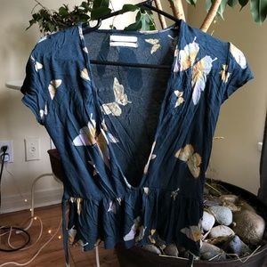 URBAN OUTFITTERS: butterfly deep V crop top